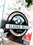 Load image into Gallery viewer, Officially Licensed K.A. Tucker "Alaska Wild Round Sign" created by FireDrake Artistry®
