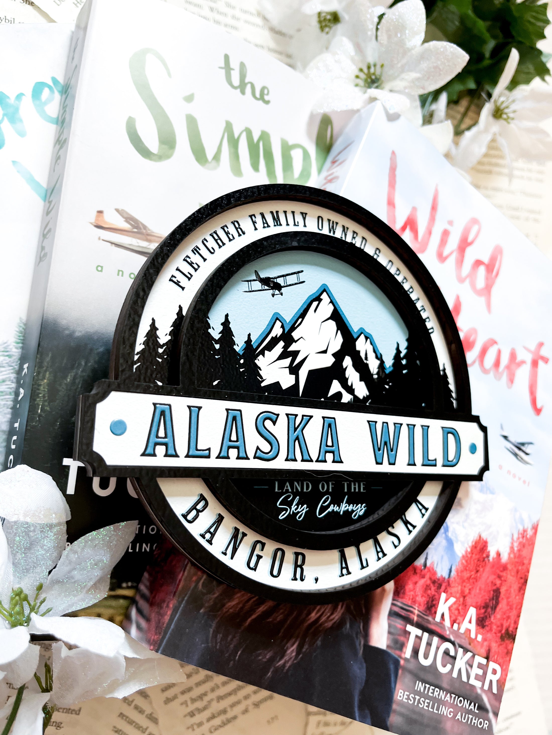 Officially Licensed K.A. Tucker "Alaska Wild Round Sign" created by FireDrake Artistry®