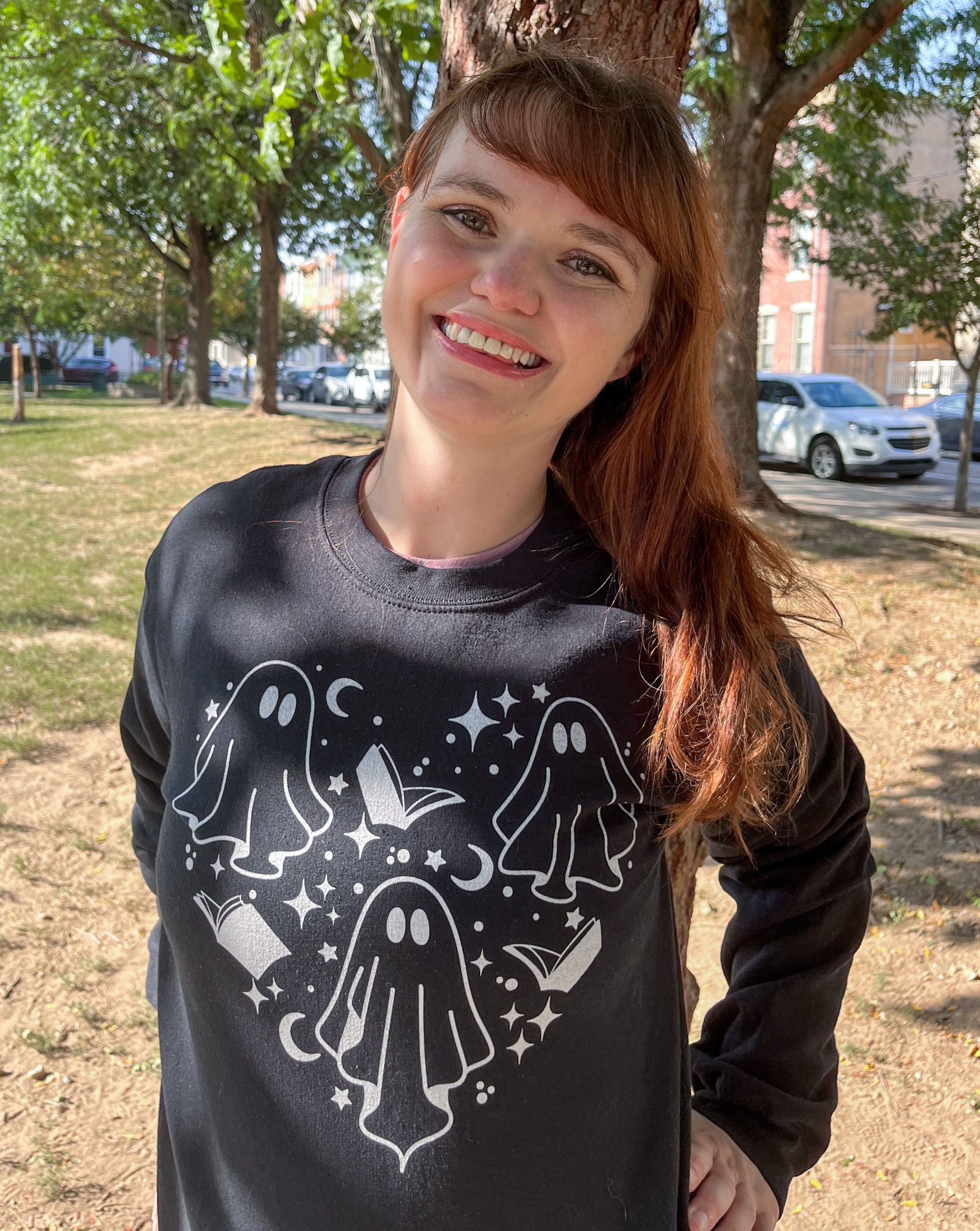 Black Boo Books Sweatshirt with white design - FireDrake Artistry™ . Photo by @jessielovenelit