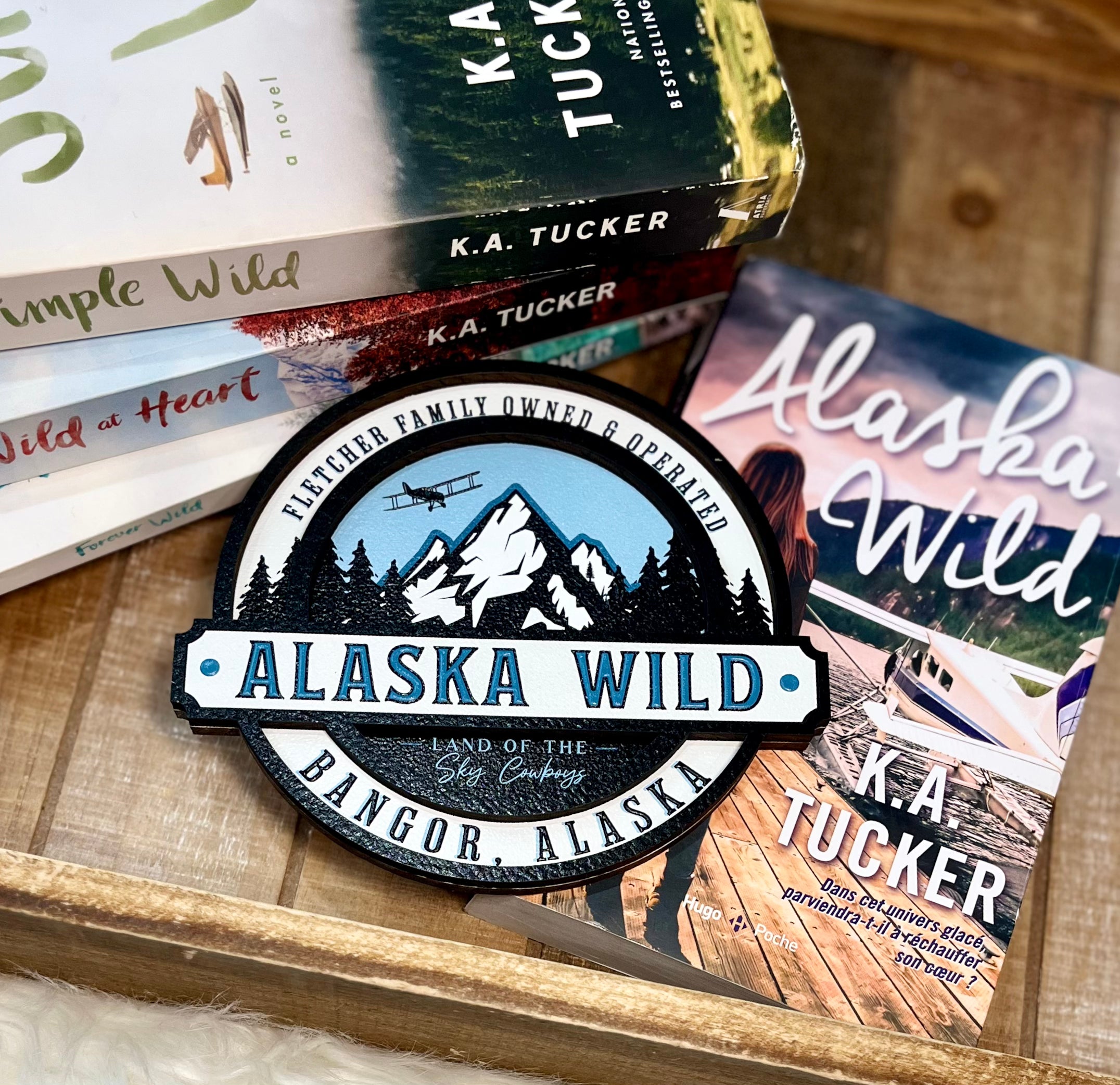 Officially Licensed K.A. Tucker "Alaska Wild Round Sign" created by FireDrake Artistry®